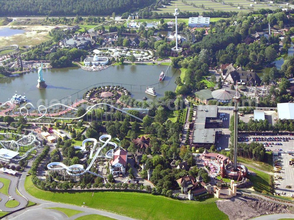 Aerial image Soltau (Niedersachsen) - Norddeutschlands größter Erlebnispark mit über 50 Fahrattraktionen,Tieren & Shows (z.B. Delfinshow und Seelöwenshow), Events, Konzerte und Sonderveranstaltungen, Event-Location für Firmenveranstaltungen, Feriendorf „Heide- Park Holiday Camp“ Gesamtfläche:850.000 Quadratmeter Besucher in 2004: 1.400.000; Mitarbeiter: 150-900 je nach Saison. Werkstätten: Bauschlosserei, Kfz.-Werkstatt, Elektrowerkstatt, Tischlerei, Zimmerei, Malerei, Klempnerei, Gärtnerei, Atelier Heide-Park Soltau GmbH, der Tussauds Group zugehörig; Heidenhof, 29614 Soltau; Telefon: 01805 – 91 91 01; Fax: 05191/91 111;