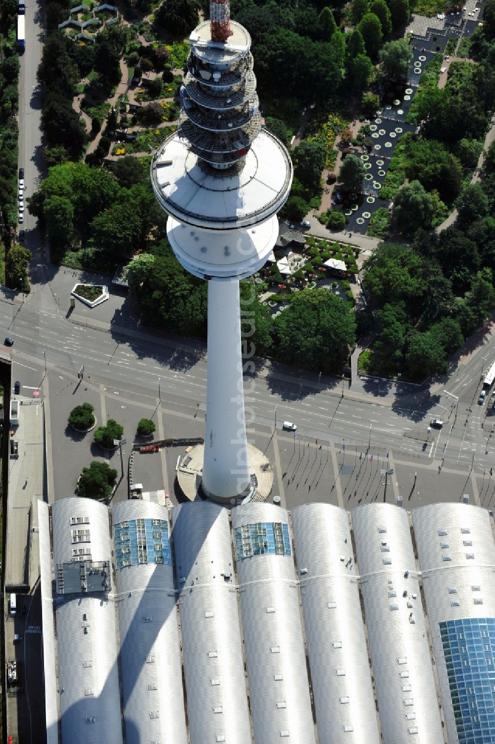 Hamburg from above - View of the Heinrich-Hertz-Turm in Hamburg. The 279m high tower, which is used for telecommunication and as broadcast station, was built from 1966 to 1968 and belongs to the Deutsche Funkturm GmbH. It is to remember the physicist Heinrich Hertz, who was born in Hamburg, and offers a rotating viewing and restaurant platform