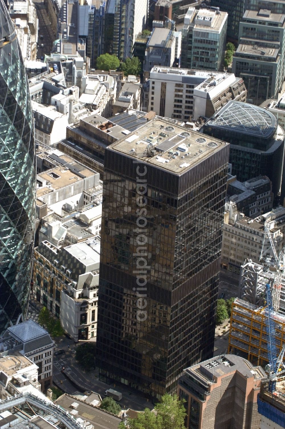 London from above - View of the skyscraper of St. Helen's, London. St. Helen's was formerly known as the Aviva Tower or Commercial Union building. The building is an office tower in the City of London, designed by Melvin Ward Partnership Gollins and built in 1969. It is 118 meters high and has 28 floors