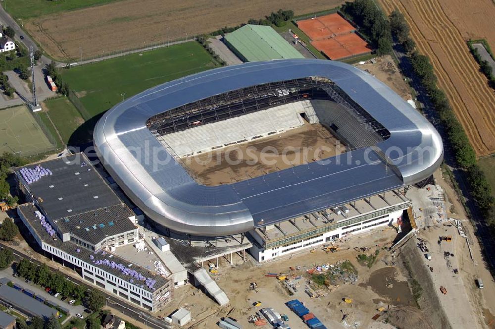 Klagenfurt from the bird's eye view: Die Hypo-Arena ist das derzeit in Bau befindliche Fußballstadion der Stadt Klagenfurt (Kärnten). Das heftig umstrittene Stadion wird für die in Klagenfurt stattfindenden Vorausscheidungsspiele der Fußball-Europameisterschaft 2008 errichtet und soll in späterer Folge als Heimstadion für den SK Austria Kärnten dienen. Es befindet sich im Stadtteil Waidmannsdorf an der Umfahrungsstraße Südring.