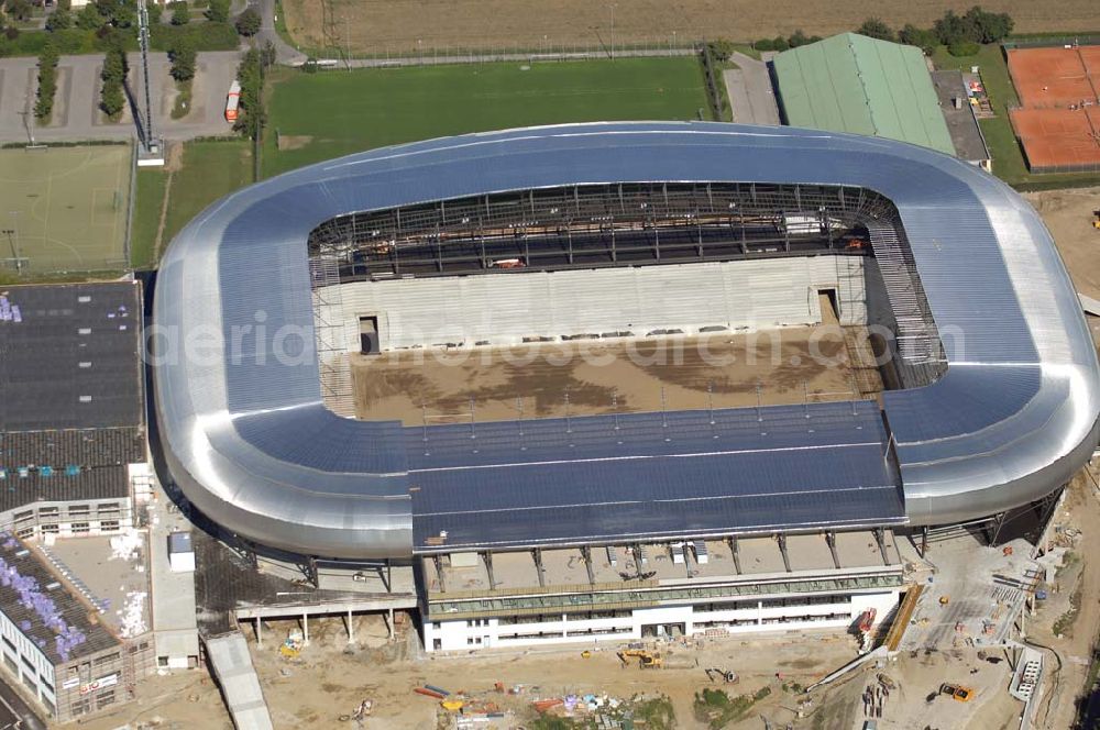 Aerial photograph Klagenfurt - Die Hypo-Arena ist das derzeit in Bau befindliche Fußballstadion der Stadt Klagenfurt (Kärnten). Das heftig umstrittene Stadion wird für die in Klagenfurt stattfindenden Vorausscheidungsspiele der Fußball-Europameisterschaft 2008 errichtet und soll in späterer Folge als Heimstadion für den SK Austria Kärnten dienen. Es befindet sich im Stadtteil Waidmannsdorf an der Umfahrungsstraße Südring.