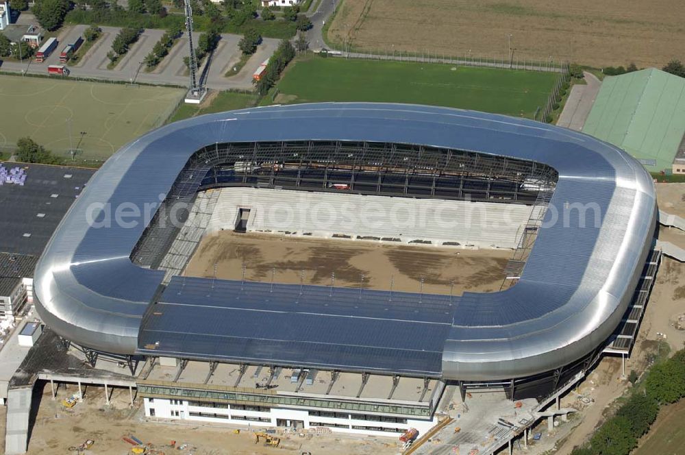 Aerial image Klagenfurt - Die Hypo-Arena ist das derzeit in Bau befindliche Fußballstadion der Stadt Klagenfurt (Kärnten). Das heftig umstrittene Stadion wird für die in Klagenfurt stattfindenden Vorausscheidungsspiele der Fußball-Europameisterschaft 2008 errichtet und soll in späterer Folge als Heimstadion für den SK Austria Kärnten dienen. Es befindet sich im Stadtteil Waidmannsdorf an der Umfahrungsstraße Südring.