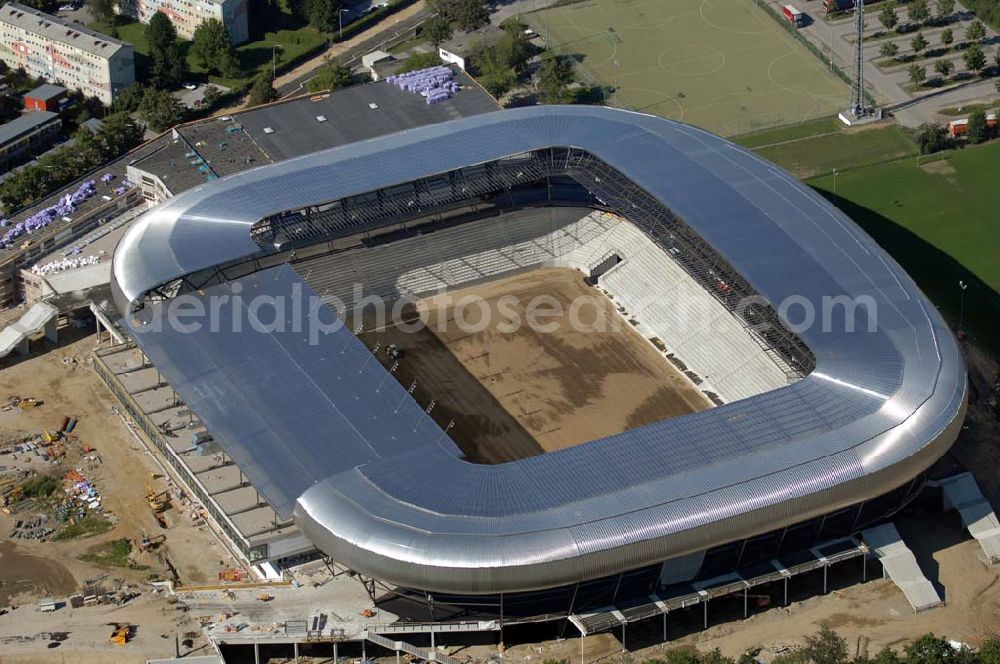 Klagenfurt from the bird's eye view: Die Hypo-Arena ist das derzeit in Bau befindliche Fußballstadion der Stadt Klagenfurt (Kärnten). Das heftig umstrittene Stadion wird für die in Klagenfurt stattfindenden Vorausscheidungsspiele der Fußball-Europameisterschaft 2008 errichtet und soll in späterer Folge als Heimstadion für den SK Austria Kärnten dienen. Es befindet sich im Stadtteil Waidmannsdorf an der Umfahrungsstraße Südring.