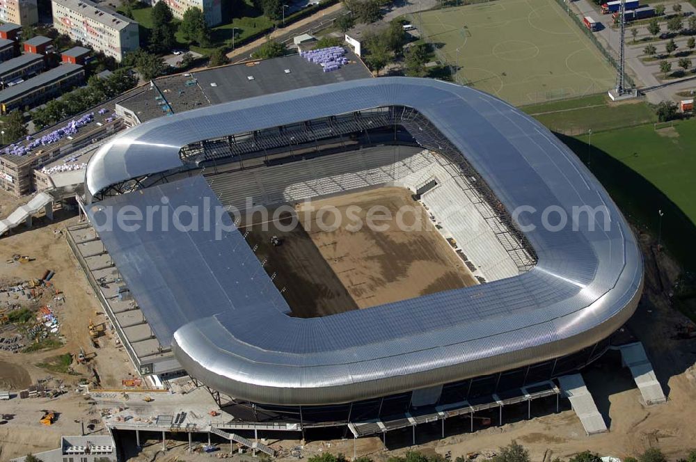 Aerial image Klagenfurt - Die Hypo-Arena ist das derzeit in Bau befindliche Fußballstadion der Stadt Klagenfurt (Kärnten). Das heftig umstrittene Stadion wird für die in Klagenfurt stattfindenden Vorausscheidungsspiele der Fußball-Europameisterschaft 2008 errichtet und soll in späterer Folge als Heimstadion für den SK Austria Kärnten dienen. Es befindet sich im Stadtteil Waidmannsdorf an der Umfahrungsstraße Südring.