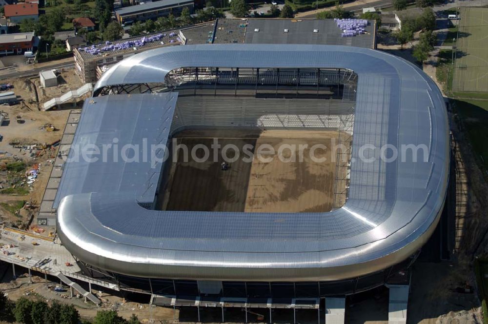 Aerial image Klagenfurt - Die Hypo-Arena ist das derzeit in Bau befindliche Fußballstadion der Stadt Klagenfurt (Kärnten). Das heftig umstrittene Stadion wird für die in Klagenfurt stattfindenden Vorausscheidungsspiele der Fußball-Europameisterschaft 2008 errichtet und soll in späterer Folge als Heimstadion für den SK Austria Kärnten dienen. Es befindet sich im Stadtteil Waidmannsdorf an der Umfahrungsstraße Südring.