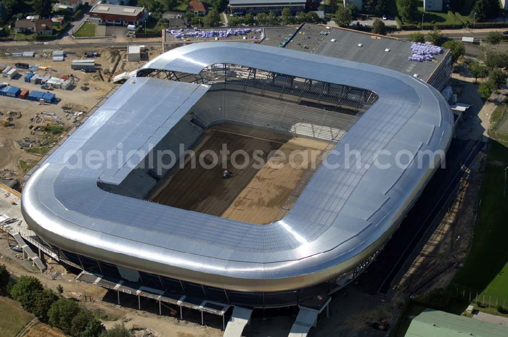 Aerial photograph Klagenfurt - Die Hypo-Arena ist das derzeit in Bau befindliche Fußballstadion der Stadt Klagenfurt (Kärnten). Das heftig umstrittene Stadion wird für die in Klagenfurt stattfindenden Vorausscheidungsspiele der Fußball-Europameisterschaft 2008 errichtet und soll in späterer Folge als Heimstadion für den SK Austria Kärnten dienen. Es befindet sich im Stadtteil Waidmannsdorf an der Umfahrungsstraße Südring.