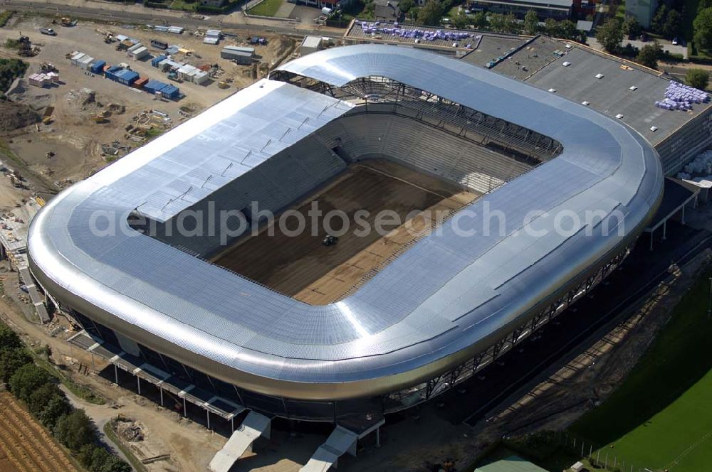 Aerial image Klagenfurt - Die Hypo-Arena ist das derzeit in Bau befindliche Fußballstadion der Stadt Klagenfurt (Kärnten). Das heftig umstrittene Stadion wird für die in Klagenfurt stattfindenden Vorausscheidungsspiele der Fußball-Europameisterschaft 2008 errichtet und soll in späterer Folge als Heimstadion für den SK Austria Kärnten dienen. Es befindet sich im Stadtteil Waidmannsdorf an der Umfahrungsstraße Südring.