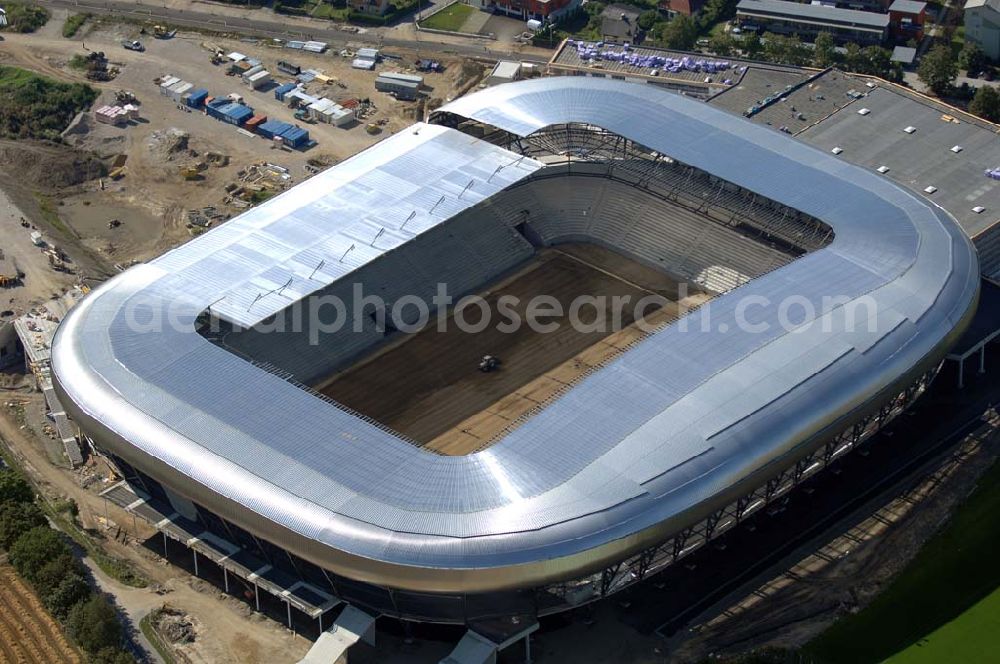 Klagenfurt from the bird's eye view: Die Hypo-Arena ist das derzeit in Bau befindliche Fußballstadion der Stadt Klagenfurt (Kärnten). Das heftig umstrittene Stadion wird für die in Klagenfurt stattfindenden Vorausscheidungsspiele der Fußball-Europameisterschaft 2008 errichtet und soll in späterer Folge als Heimstadion für den SK Austria Kärnten dienen. Es befindet sich im Stadtteil Waidmannsdorf an der Umfahrungsstraße Südring.