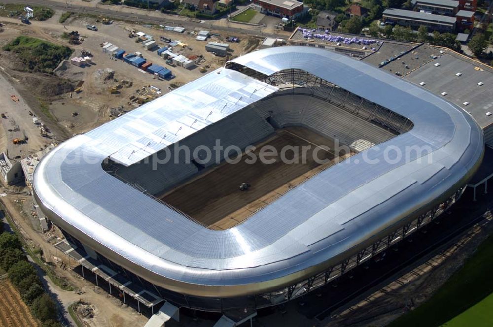 Aerial image Klagenfurt - Die Hypo-Arena ist das derzeit in Bau befindliche Fußballstadion der Stadt Klagenfurt (Kärnten). Das heftig umstrittene Stadion wird für die in Klagenfurt stattfindenden Vorausscheidungsspiele der Fußball-Europameisterschaft 2008 errichtet und soll in späterer Folge als Heimstadion für den SK Austria Kärnten dienen. Es befindet sich im Stadtteil Waidmannsdorf an der Umfahrungsstraße Südring.