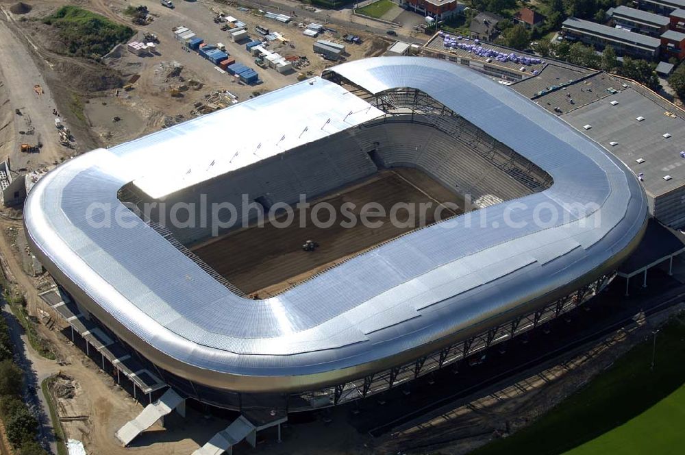 Aerial photograph Klagenfurt - Die Hypo-Arena ist das derzeit in Bau befindliche Fußballstadion der Stadt Klagenfurt (Kärnten). Das heftig umstrittene Stadion wird für die in Klagenfurt stattfindenden Vorausscheidungsspiele der Fußball-Europameisterschaft 2008 errichtet und soll in späterer Folge als Heimstadion für den SK Austria Kärnten dienen. Es befindet sich im Stadtteil Waidmannsdorf an der Umfahrungsstraße Südring.