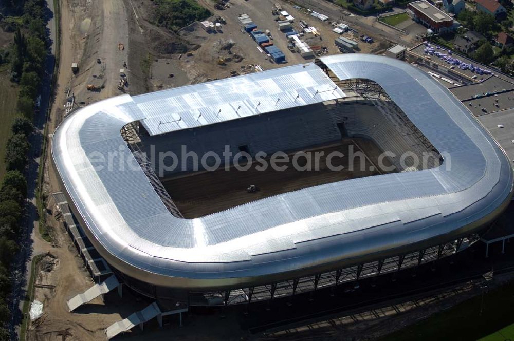 Klagenfurt from the bird's eye view: Die Hypo-Arena ist das derzeit in Bau befindliche Fußballstadion der Stadt Klagenfurt (Kärnten). Das heftig umstrittene Stadion wird für die in Klagenfurt stattfindenden Vorausscheidungsspiele der Fußball-Europameisterschaft 2008 errichtet und soll in späterer Folge als Heimstadion für den SK Austria Kärnten dienen. Es befindet sich im Stadtteil Waidmannsdorf an der Umfahrungsstraße Südring.