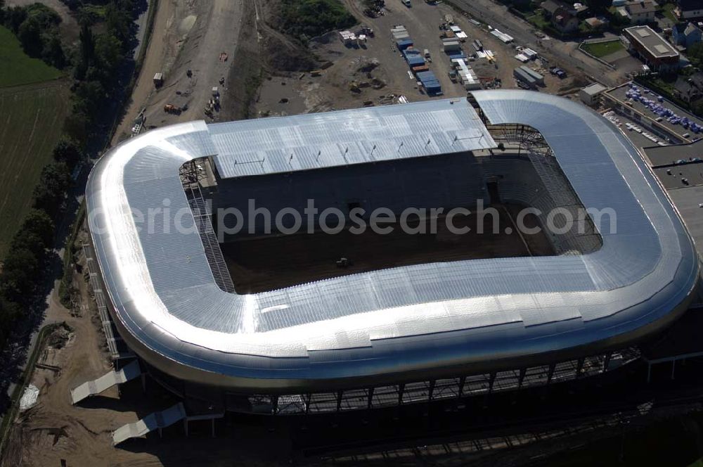 Aerial image Klagenfurt - Die Hypo-Arena ist das derzeit in Bau befindliche Fußballstadion der Stadt Klagenfurt (Kärnten). Das heftig umstrittene Stadion wird für die in Klagenfurt stattfindenden Vorausscheidungsspiele der Fußball-Europameisterschaft 2008 errichtet und soll in späterer Folge als Heimstadion für den SK Austria Kärnten dienen. Es befindet sich im Stadtteil Waidmannsdorf an der Umfahrungsstraße Südring.