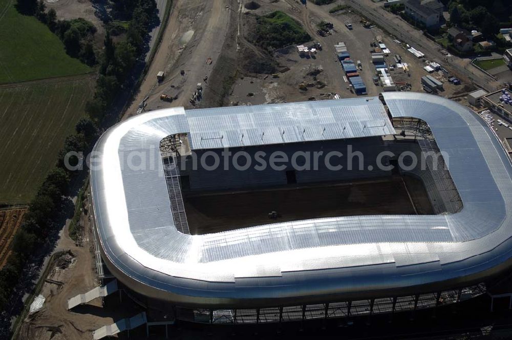 Aerial photograph Klagenfurt - Die Hypo-Arena ist das derzeit in Bau befindliche Fußballstadion der Stadt Klagenfurt (Kärnten). Das heftig umstrittene Stadion wird für die in Klagenfurt stattfindenden Vorausscheidungsspiele der Fußball-Europameisterschaft 2008 errichtet und soll in späterer Folge als Heimstadion für den SK Austria Kärnten dienen. Es befindet sich im Stadtteil Waidmannsdorf an der Umfahrungsstraße Südring.