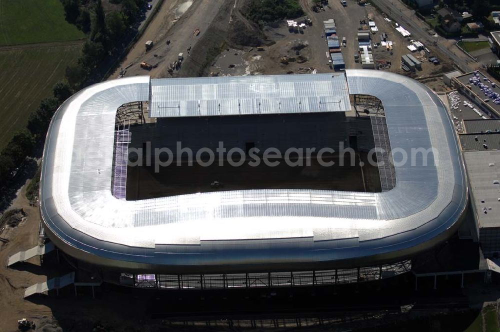 Aerial image Klagenfurt - Die Hypo-Arena ist das derzeit in Bau befindliche Fußballstadion der Stadt Klagenfurt (Kärnten). Das heftig umstrittene Stadion wird für die in Klagenfurt stattfindenden Vorausscheidungsspiele der Fußball-Europameisterschaft 2008 errichtet und soll in späterer Folge als Heimstadion für den SK Austria Kärnten dienen. Es befindet sich im Stadtteil Waidmannsdorf an der Umfahrungsstraße Südring.