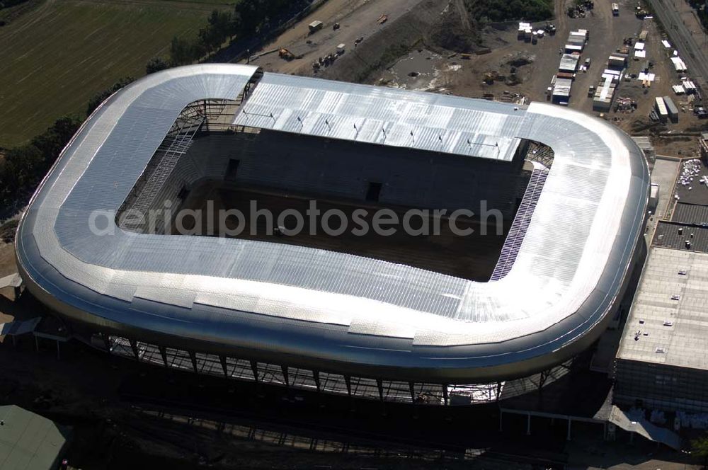 Aerial photograph Klagenfurt - Die Hypo-Arena ist das derzeit in Bau befindliche Fußballstadion der Stadt Klagenfurt (Kärnten). Das heftig umstrittene Stadion wird für die in Klagenfurt stattfindenden Vorausscheidungsspiele der Fußball-Europameisterschaft 2008 errichtet und soll in späterer Folge als Heimstadion für den SK Austria Kärnten dienen. Es befindet sich im Stadtteil Waidmannsdorf an der Umfahrungsstraße Südring.