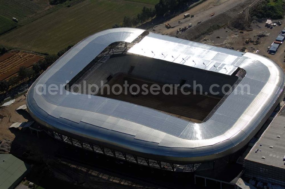 Aerial image Klagenfurt - Die Hypo-Arena ist das derzeit in Bau befindliche Fußballstadion der Stadt Klagenfurt (Kärnten). Das heftig umstrittene Stadion wird für die in Klagenfurt stattfindenden Vorausscheidungsspiele der Fußball-Europameisterschaft 2008 errichtet und soll in späterer Folge als Heimstadion für den SK Austria Kärnten dienen. Es befindet sich im Stadtteil Waidmannsdorf an der Umfahrungsstraße Südring.