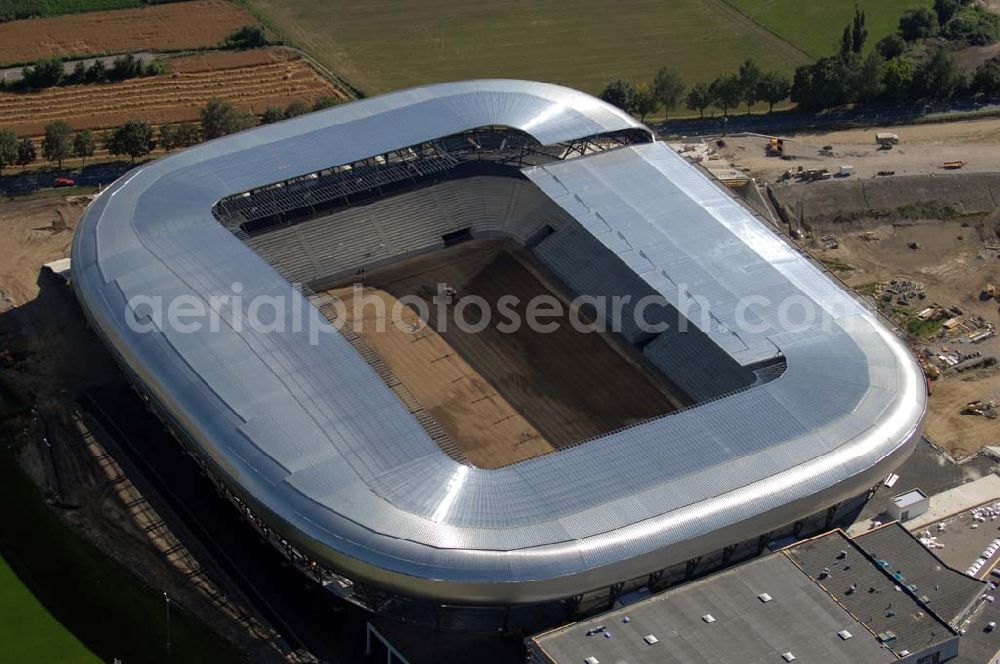 Aerial image Klagenfurt - Die Hypo-Arena ist das derzeit in Bau befindliche Fußballstadion der Stadt Klagenfurt (Kärnten). Das heftig umstrittene Stadion wird für die in Klagenfurt stattfindenden Vorausscheidungsspiele der Fußball-Europameisterschaft 2008 errichtet und soll in späterer Folge als Heimstadion für den SK Austria Kärnten dienen. Es befindet sich im Stadtteil Waidmannsdorf an der Umfahrungsstraße Südring.