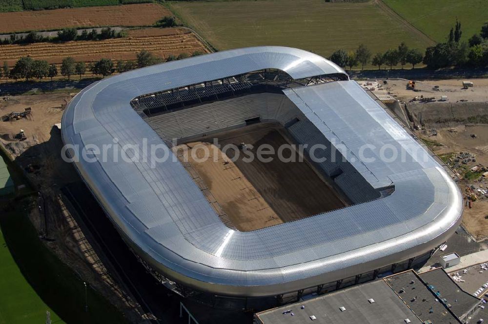 Aerial photograph Klagenfurt - Die Hypo-Arena ist das derzeit in Bau befindliche Fußballstadion der Stadt Klagenfurt (Kärnten). Das heftig umstrittene Stadion wird für die in Klagenfurt stattfindenden Vorausscheidungsspiele der Fußball-Europameisterschaft 2008 errichtet und soll in späterer Folge als Heimstadion für den SK Austria Kärnten dienen. Es befindet sich im Stadtteil Waidmannsdorf an der Umfahrungsstraße Südring.