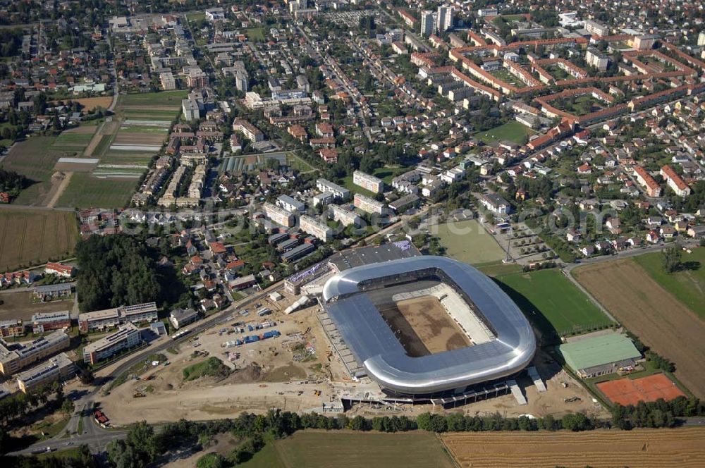 Aerial image Klagenfurt - Die Hypo-Arena ist das derzeit in Bau befindliche Fußballstadion der Stadt Klagenfurt (Kärnten). Das heftig umstrittene Stadion wird für die in Klagenfurt stattfindenden Vorausscheidungsspiele der Fußball-Europameisterschaft 2008 errichtet und soll in späterer Folge als Heimstadion für den SK Austria Kärnten dienen. Es befindet sich im Stadtteil Waidmannsdorf an der Umfahrungsstraße Südring.