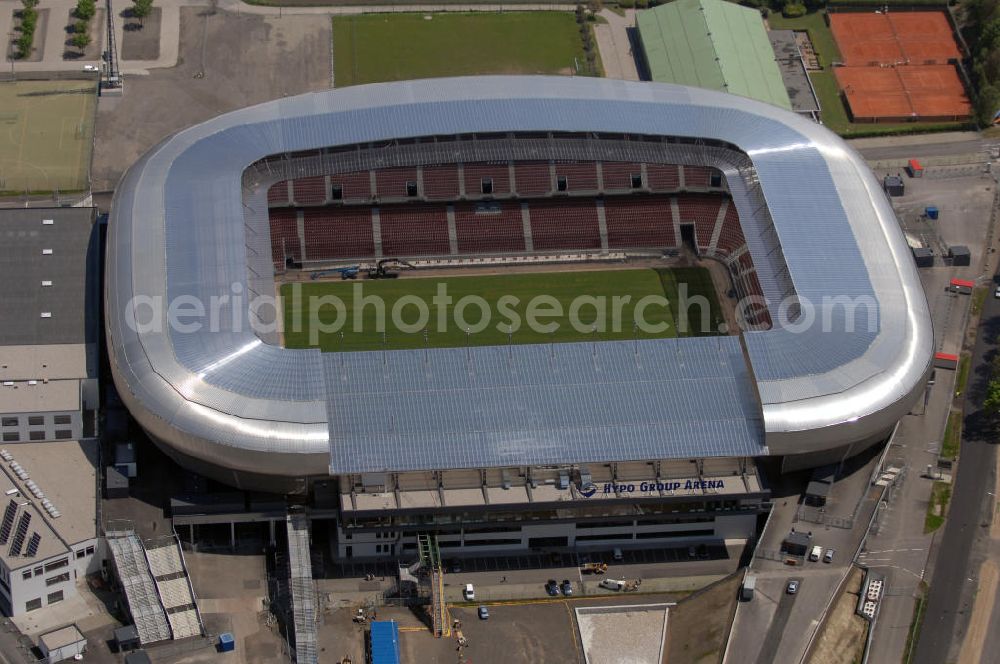 Aerial photograph Klagenfurt - Die Hypo Group Arena (traditionell Wörtherseestadion) ist ein österreichisches Fußballstadion im Klagenfurter Stadtteil Waidmannsdorf. Es ist das Heimstadion des Bundesligisten SK Austria Kärnten und für 12.500 Personen konzipiert. Als Austragungsort der Fußball Europameisterschaft 2008 wird es kurzfristig 32.000 Zuschauer aufnehmen können. Weitere Teile des angrenzenden Sportparks sind ein Ballsportkompetenzzentrum, eine Fußballakademie, Kletterwände, Ruderbecken und eine Leichtathletikanlage.