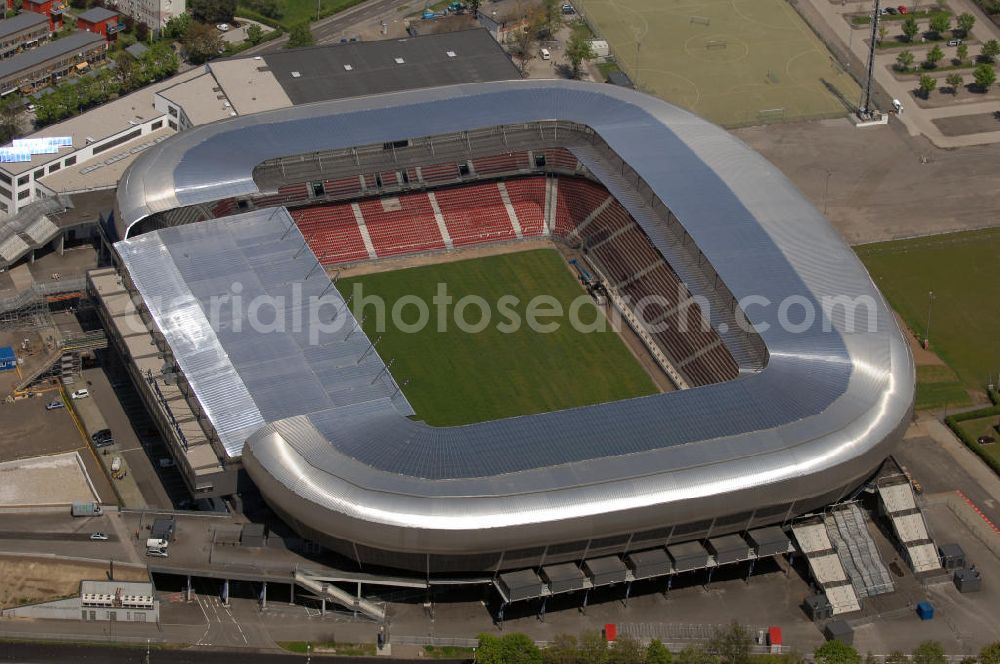 Aerial photograph Klagenfurt - Die Hypo Group Arena (traditionell Wörtherseestadion) ist ein österreichisches Fußballstadion im Klagenfurter Stadtteil Waidmannsdorf. Es ist das Heimstadion des Bundesligisten SK Austria Kärnten und für 12.500 Personen konzipiert. Als Austragungsort der Fußball Europameisterschaft 2008 wird es kurzfristig 32.000 Zuschauer aufnehmen können. Weitere Teile des angrenzenden Sportparks sind ein Ballsportkompetenzzentrum, eine Fußballakademie, Kletterwände, Ruderbecken und eine Leichtathletikanlage.