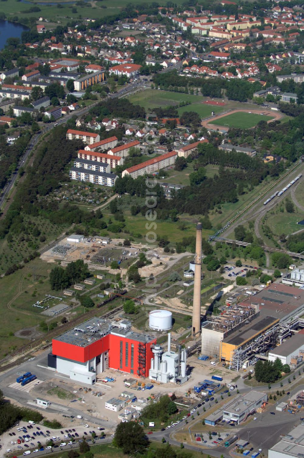 Premnitz from the bird's eye view: Blick auf den Industriepark Premnitz IPP mit der EEW Premnitz GmbH. Sie erzeugt Energie, Wärme und Prozessdampf aus Abfallverbrennung. Kontakt Industriepark: Stadt Premnitz, Mike Stampehl, G.-Hauptmann-Str. 21, 14 727 Premnitz, Tel. +49 (0)3386 259 133, +49 (0)3386 259 111, Email m.stampehl@premnitz.de