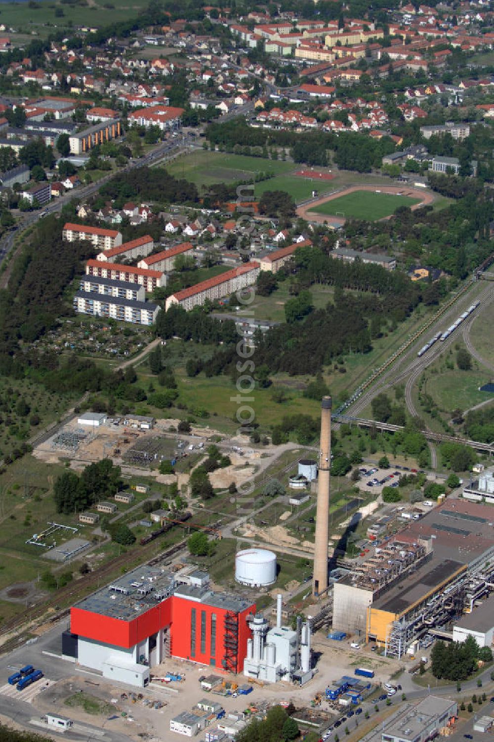 Aerial photograph Premnitz - Blick auf den Industriepark Premnitz IPP mit der EEW Premnitz GmbH. Sie erzeugt Energie, Wärme und Prozessdampf aus Abfallverbrennung. Kontakt Industriepark: Stadt Premnitz, Mike Stampehl, G.-Hauptmann-Str. 21, 14 727 Premnitz, Tel. +49 (0)3386 259 133, +49 (0)3386 259 111, Email m.stampehl@premnitz.de