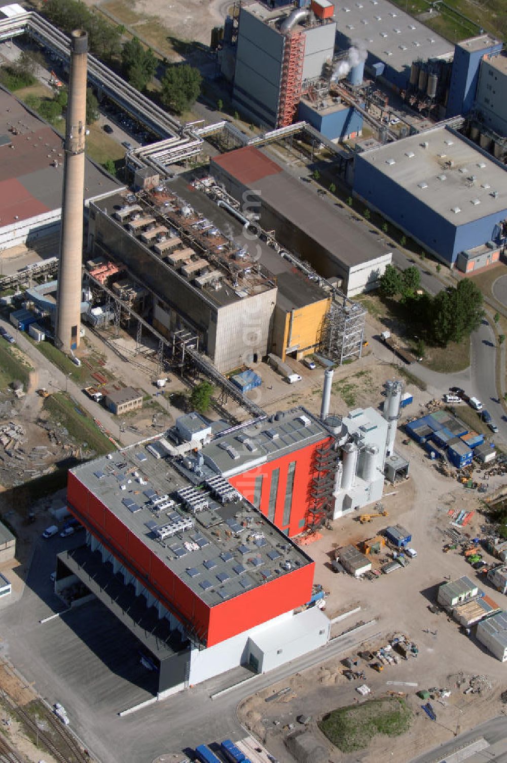 Premnitz from the bird's eye view: Blick auf den Industriepark Premnitz IPP mit der EEW Premnitz GmbH. Sie erzeugt Energie, Wärme und Prozessdampf aus Abfallverbrennung. Kontakt Industriepark: Stadt Premnitz, Mike Stampehl, G.-Hauptmann-Str. 21, 14 727 Premnitz, Tel. +49 (0)3386 259 133, +49 (0)3386 259 111, Email m.stampehl@premnitz.de