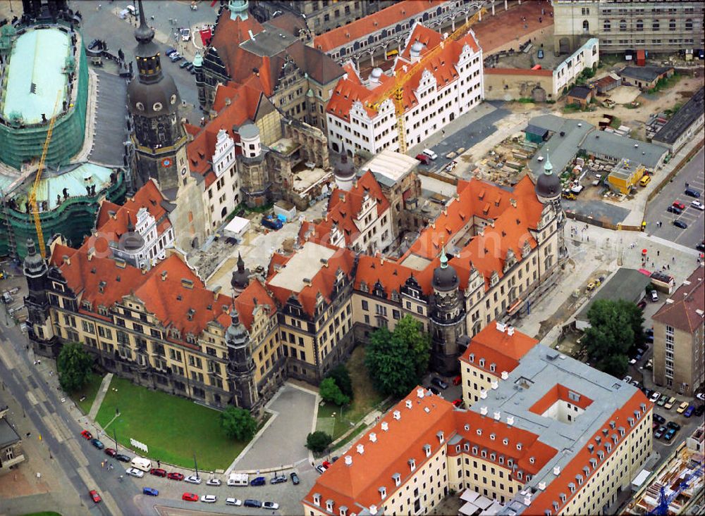 Dresden from the bird's eye view: the courtyard of the Dresden castle. More than 50 years after its destruction, this image shows the damage from the February 1945. The reconstruction began is visible. The 101 m high Hausmannsturm was completed in 1991