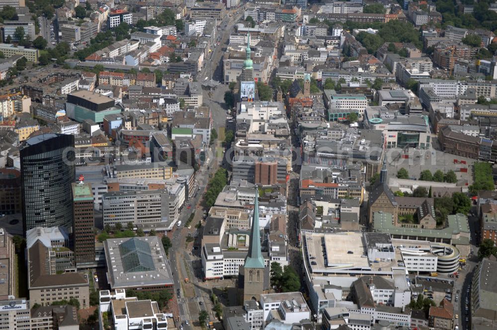 Aerial photograph Dortmund - Blick auf die Innenstadt-West in Dortmund. Links steht der RWE-Tower hinter dem Sparkassen-Tower. Im Vordergrund steht die St.-Petri-Kirche. Diese ist eine evangelische, städtische westfälische Hallenkirche in hochgotischem Stil. Adresse: Petrikirchhof 7, 44137 Dortmund, Email buero@StPetriDo.de, Tel. +49 (0)231 721 4173, Fax +49 (0)231 530 7330