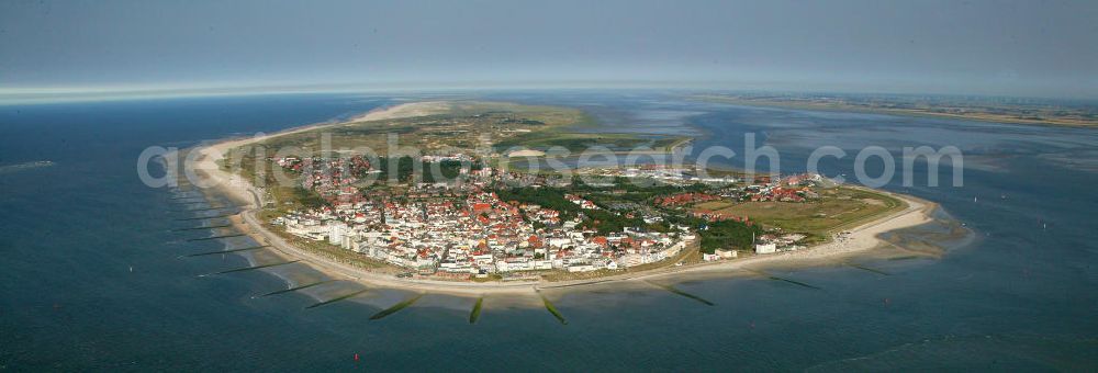 Aerial photograph Norderney - Blick auf die Stadt Norderney auf der gleichnamigen Insel. Norderney ist von Westen gesehen die dritte der sieben zu Niedersachsen gehörenden ostfriesischen Inseln, die in der Nordsee dem Festland vorgelagert sind. Im Süden der Insel erstreckt sich das Wattenmeer. View of the city of Norderney on the same-named island. Norderney is seen from the west, the third of seven East Frisian Islands belonging to Lower Saxony, which are upstream in the North Sea to the mainland. In the south of the island extends the Wadden Sea.