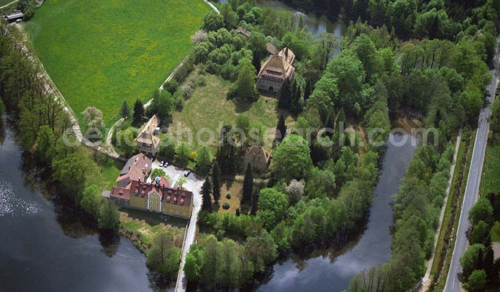 Aerial image Tharandt - Blick auf das Jagdschloss Grillenburg im Tharandter Wald, dessen Ursprünge bis ins 12. Jahrhundert zurück reichen. Kontakt: Tel.: (03 52 03) 38 31282,