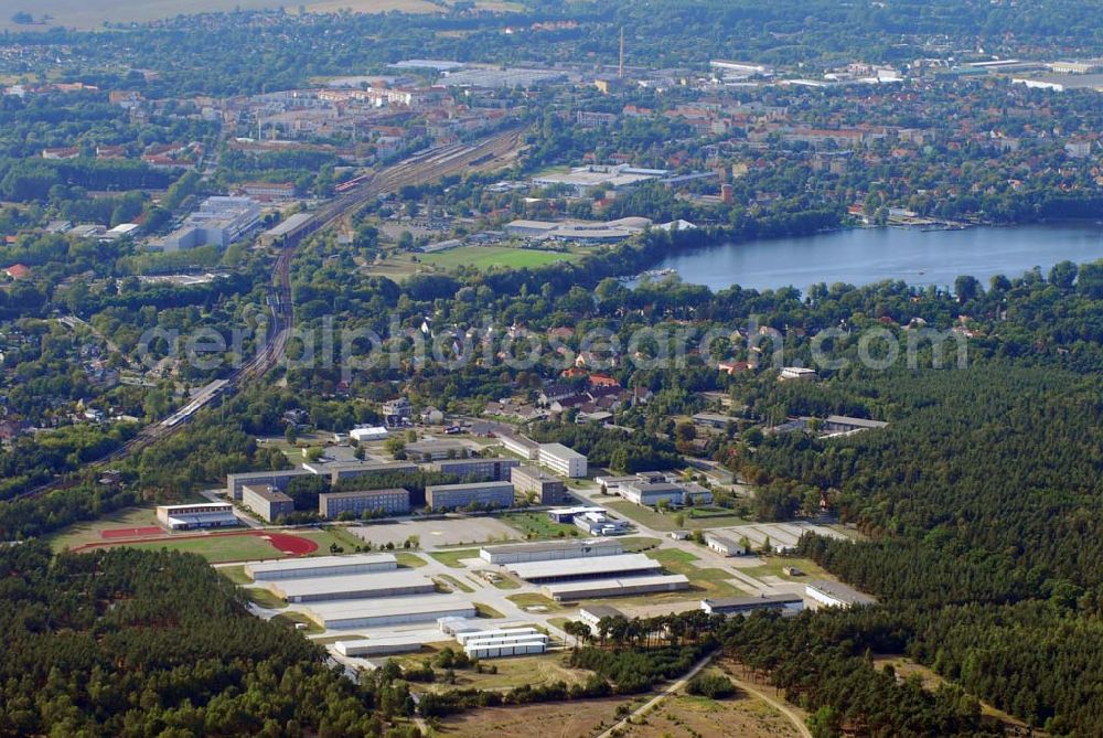 Aerial photograph Lehnitz - Blick auf das Kasernengelände am ehemaligen Truppenübungsplatz Lehnitz bei Oranienburg. das Gelände wurde unlängst von der Bundeswehr an die Bundesanstalt für Immobilienaufgaben übertragen und soll nun einer neuen Verwendung und Renaturisierungsmaßnahmen zugeführt werden.