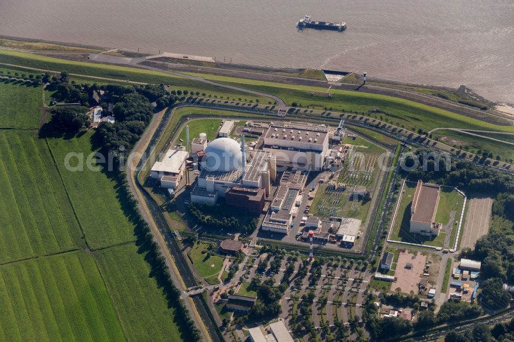 Aerial image Brokdorf - View of the nuclear power plant Brokdorf near the homonymous small town in Schleswig-Holstein. It was commissioned in October 1986 by the former owners Preussen Elektra and HEW. Since 2010, the plant belongs to E.ON (80%) and Vattenfall (20%). The final shutdown of the plant is scheduled not later than 2021