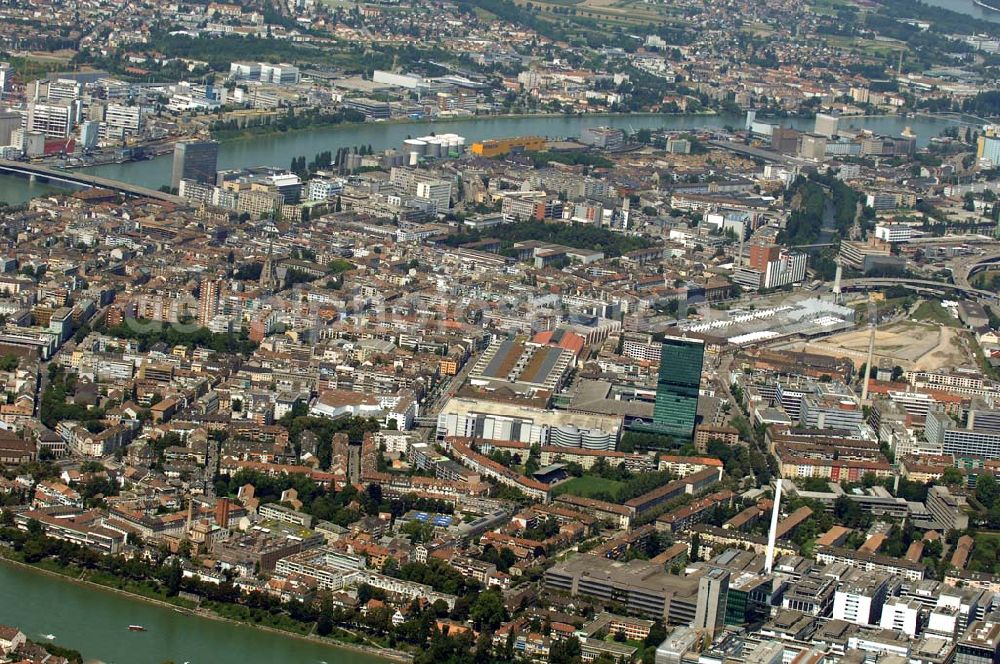 Aerial photograph BASEL - Kleinbasel ist der rechtsrheinische Teil der im Nordwesten der Schweiz gelegenen Stadt Basel. Der 105 Meter hohe Messeturm am Messeplatz (vorne rechts im Bild) ist ein neues Wahrzeichen der Stadt Basel.