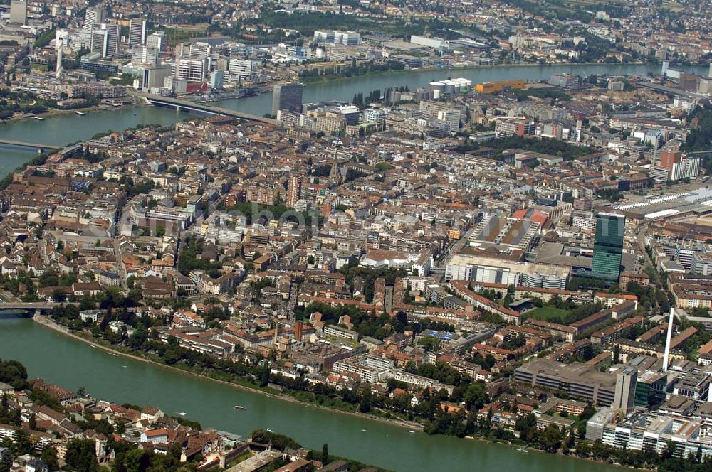 BASEL from above - Kleinbasel ist der rechtsrheinische Teil der im Nordwesten der Schweiz gelegenen Stadt Basel. Der 105 Meter hohe Messeturm am Messeplatz (vorne rechts im Bild) ist ein neues Wahrzeichen der Stadt Basel.