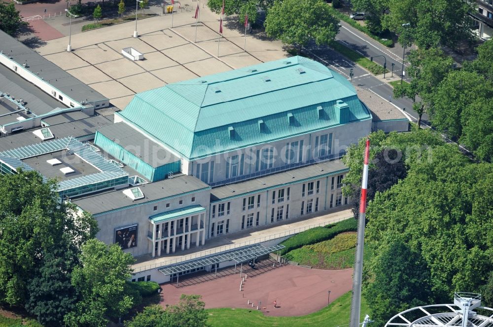 Aerial image Essen - View of the concert hall Saalbau at the edge of the garden city in the state of North Rhine-Westphalia. Today it is headquarters of the Philharmonic Essen. The building, as it stands today, was after the end of the Second World War, in the years 1949 to 1954, built in the sober style. The most striking external feature was and is the mansard roof clad with copper