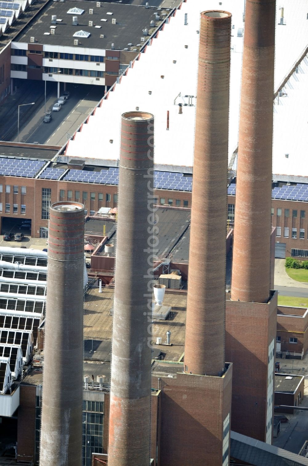 Wolfsburg from the bird's eye view: View of the power plant of Volkswagen factory in Wolfsburg. Supplied by Volkswagen AG and managed by the subsidiary Volkswagen Kraftwerk GmbH, the cogeneration plant supplies the seat and the adjacent Autostadt of the Volkswagen AG with electricity and heat as well as the city of Wolfsburg with district heating