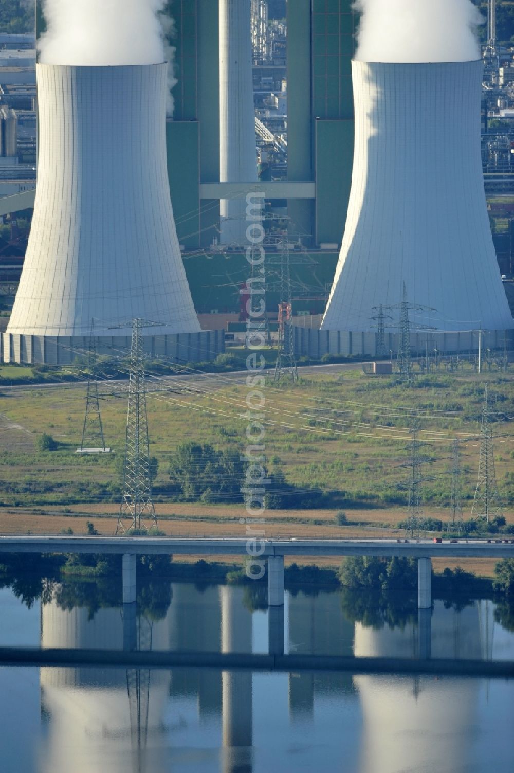 Aerial image Schkopau - View of power plant smokestacks in the mirror image of Rattmansdorfer pond in Schkopau in the state of Saxony-Anhalt. The two chimneys are part of the lignite-fired power plant of E.ON AG