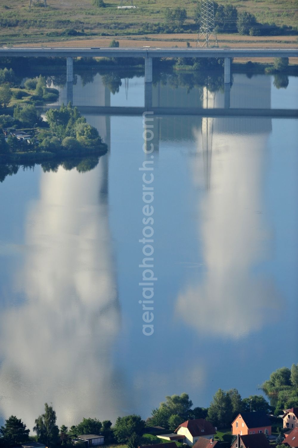 Schkopau from the bird's eye view: View of power plant smokestacks in the mirror image of Rattmansdorfer pond in Schkopau in the state of Saxony-Anhalt. The two chimneys are part of the lignite-fired power plant of E.ON AG