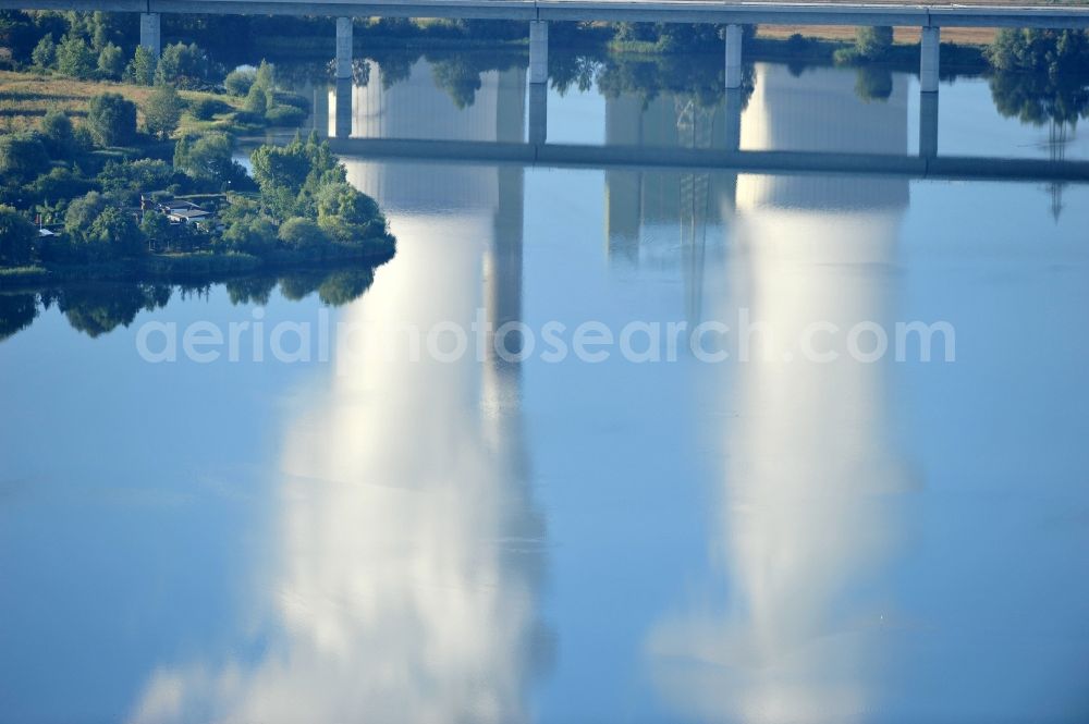 Aerial image Schkopau - View of power plant smokestacks in the mirror image of Rattmansdorfer pond in Schkopau in the state of Saxony-Anhalt. The two chimneys are part of the lignite-fired power plant of E.ON AG