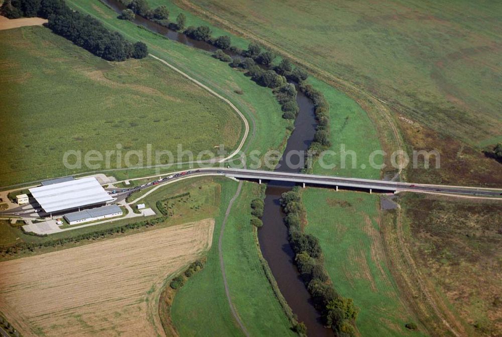 Aerial photograph Forst - Blick auf eine Brücke an der Neiße in der Kreisstadt Forst in Brandenburg. Die Stadt liegt östlich von Cottbus an der Neiße. Kontakt: Stadt Forst (Lausitz), Der Bürgermeister, Büro des Bürgermeisters / Öffentlichkeitsarbeit, Susanne Joel, Promenade 9, 03149 Forst (Lausitz), E-Mail: s.joel@forst-lausitz.de, Tel.: (03562) 989 - 102, Fax: (03562) 7460