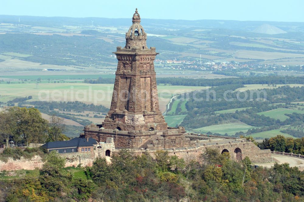 Bad Frankenhausen from the bird's eye view: Blick auf das Kyffhäuser Denkmal, Das 81 Meter hohe Kyffhäuser-Denkmal ragt in der Abenddämmerung aus dem Kyffhäuser-Gebirge bei Bad Frankenhausen im Norden Thüringens heraus. Es wurde zwischen 1891 und 1896 als Kaiser-Wilhelm-Nationaldenkmal errichtet. Das Kyffhäuser-Denkmal ist mit jährlich zirka 200.000 Besuchern neben der Wartburg-Stiftung Eisenach der meistbesuchte Ort in Thüringen.