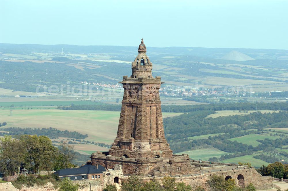 Aerial image Bad Frankenhausen - Blick auf das Kyffhäuser Denkmal, Das 81 Meter hohe Kyffhäuser-Denkmal ragt in der Abenddämmerung aus dem Kyffhäuser-Gebirge bei Bad Frankenhausen im Norden Thüringens heraus. Es wurde zwischen 1891 und 1896 als Kaiser-Wilhelm-Nationaldenkmal errichtet. Das Kyffhäuser-Denkmal ist mit jährlich zirka 200.000 Besuchern neben der Wartburg-Stiftung Eisenach der meistbesuchte Ort in Thüringen.