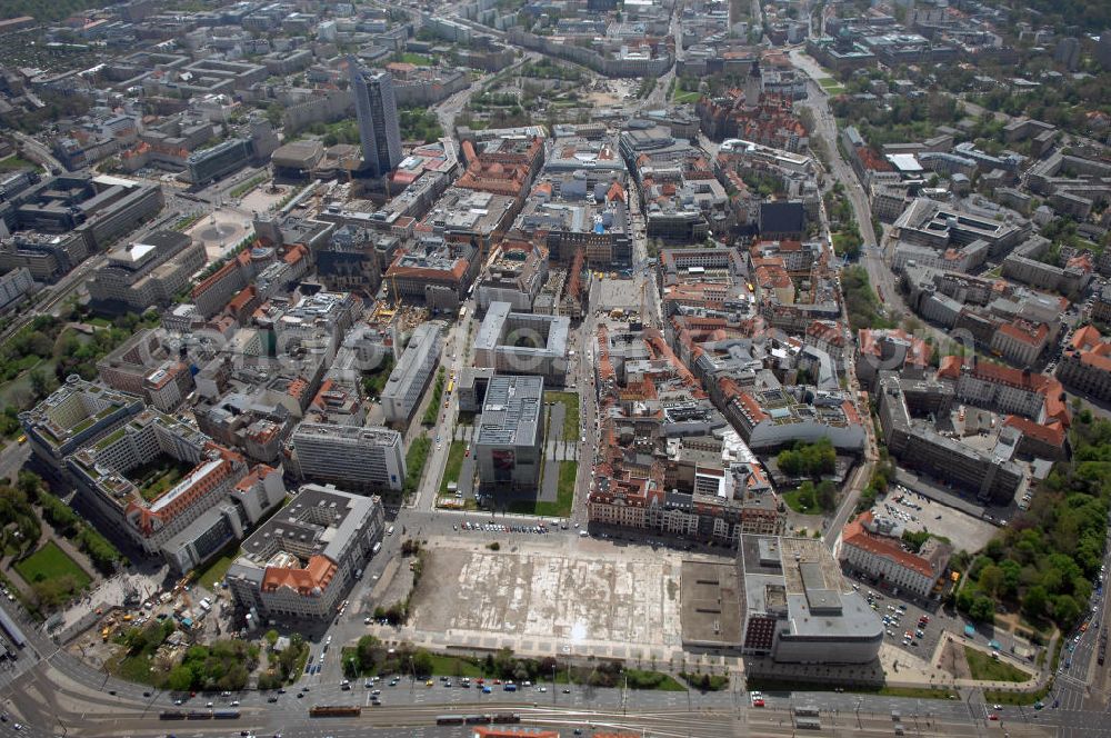 Aerial photograph Leipzig - Blick auf die Leipziger Innenstadt mit dem MDR - Hochhaus. Neubau des Hauptgebäudes der UNI Leipzig am Hochhaus des MDR am Augustusplatz in Leipzig. Es entsteht ein Neubau der Aula als multifunktionales und repräsentatives Herzstück im entstehnden Campus der Universität Leipzig am Augustusplatz durch ein 8-geschossiges Gebäude mit einer Grundfläche von ca. 4.300m². Umsetzung: BATEG Ingenieurbau