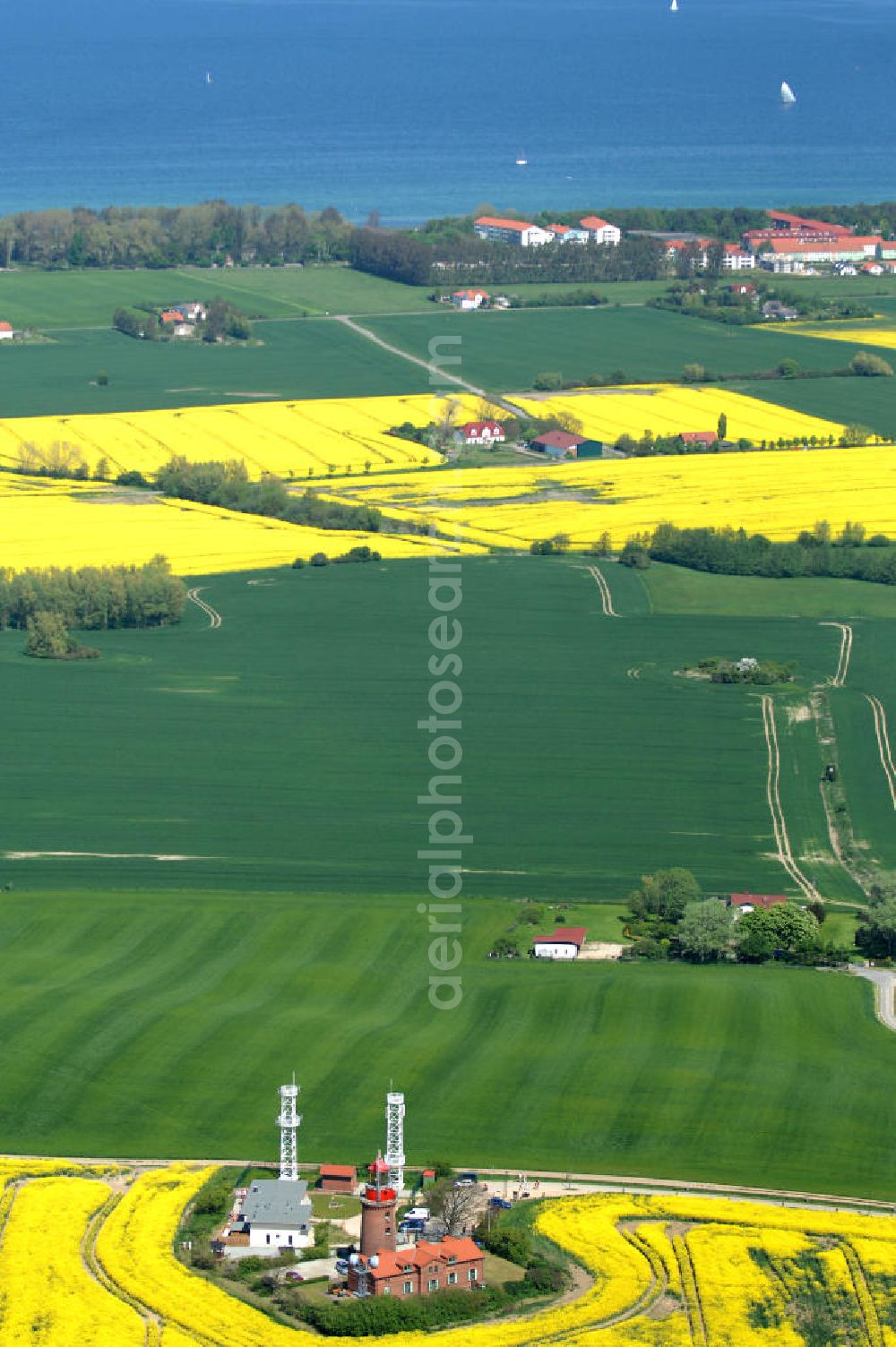 Aerial photograph Bastorf - Der Leuchtturm von Bastorf an der Mecklenburger Bucht der Ostsee oberhalb von Kap Bukspitze, deshalb auch Buk genannt, ist mit nur 20,8 m Höhe einer der kleinsten deutschen Leuchttürme. Hauptaufgabe ist die Warnung vor „Hannibal“, einer Sandbank hier in der Einfahrt zur Wismarer Bucht.