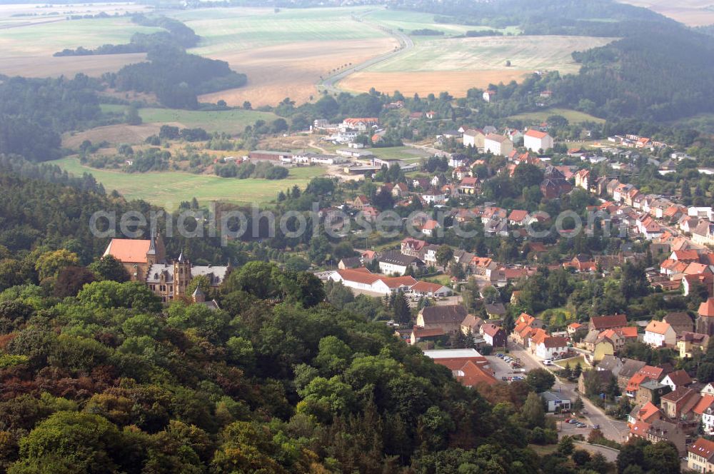 Aerial photograph Mansfeld - Blick auf die Lutherstadt Mansfeld. Sie trägt den Namenszusatz Lutherstadt, der darauf beruht, dass Martin Luther einen Großteil seiner Kindheit im Ort verbrachte. Sie liegt im östlichen Harzvorland und umfasst das Tal der Wipper. 973 wurde Mansfeld erstmals urkundlich erwähnt. 1400 erhielt es Stadtrechte. Besondere Sehenswürdigkeiten sind das Schloss und die St.-Georg-Kirche.