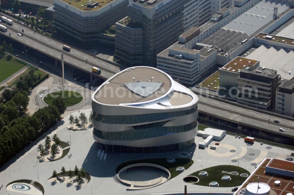 Aerial image Stuttgart - Blick auf die Mercedes-Benz Welt in Stuttgart-Bad Cannstadt. Es ist ein Kundenzentrum der Firma Mercedes-Benz. Es wurde am 19. Mai 2006 eröffnet und besteht aus dem neuen Mercedes-Benz-Museum und dem Mercedes-Benz-Center. Das Areal liegt direkt vor dem Haupttor des Daimler-Werks Untertürkheim an der B 14 auf einem künstlich aufgeschütteten Hügel gegenüber dem Gottlieb-Daimler-Stadion. Kontakt: Mercedesstr. 100, 70372 Stuttgart, Tel. +49 (0)711 17 30 000, Fax +49 (0)711 17 30 400, Email mercedes-benz-museum@daimler.com