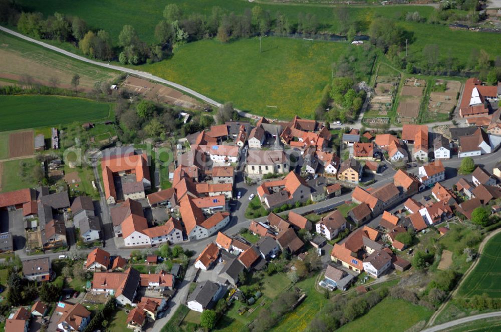 Aerial image Münnerstadt - Blick auf Münnerstadt OT Althausen. Umgeben wird die Stadt im Westen von Schindberg und Michelsberg, im Süden vom Karlsberg und im Osten von der Zent. Im Norden öffnet sich das weite Lauertal. Das Gebiet der heutigen Stadt Münnerstadt ist uraltes Siedlungsgebiet. Stadtverwaltung: Marktplatz 1, 97702 Münnerstadt , Tel. +49 (0)9733 8105 0