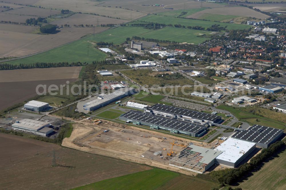 Aerial photograph Nauen - Blick auf Nauen mit den Produktionszentrum BSH Hausgerätewerks Nauen GmbH im Gewerbegebiet Nauen. Kontakt: BSH Hausgerätewerk Nauen GmbH, Fabrik Nauen, Siemensring 5-9, 14641 Nauen, Tel. 03321 416-0, Fax 03321 416 202,